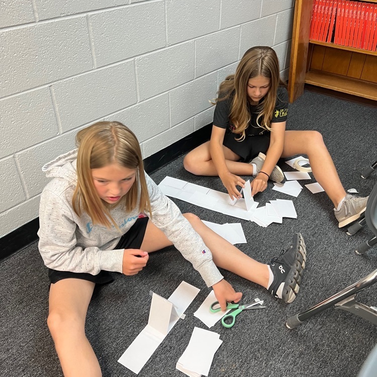 5th grade is building a tall tower.